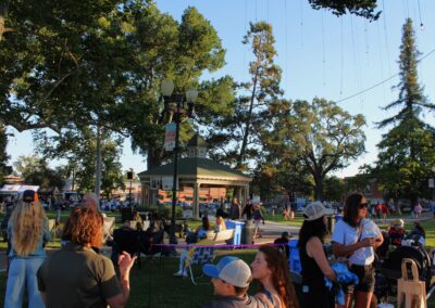 Paso Robles Downtown City Park filled with people enjoying a band playing from a green central gazebo